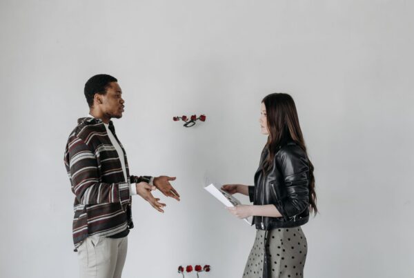 Man and woman having a face-to-face conversation